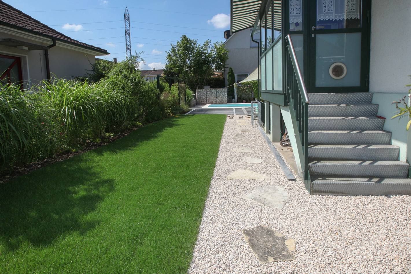 HS Gartenbau GmbH Hofer & Steiner Terrasse mit Treppe zum Haus